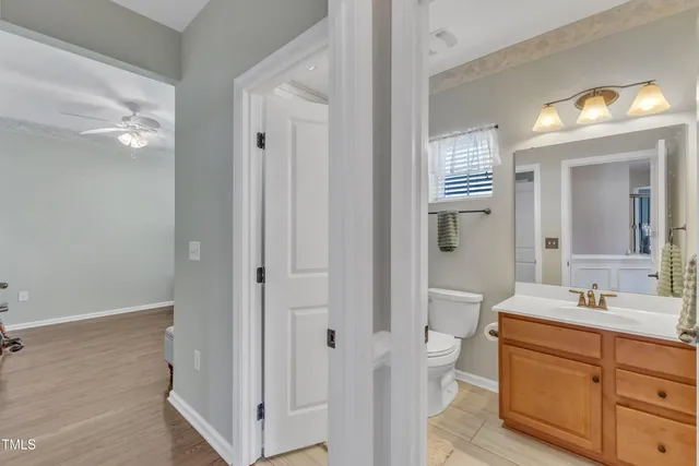 a kitchen with stainless steel appliances granite countertop a refrigerator a stove and a sink