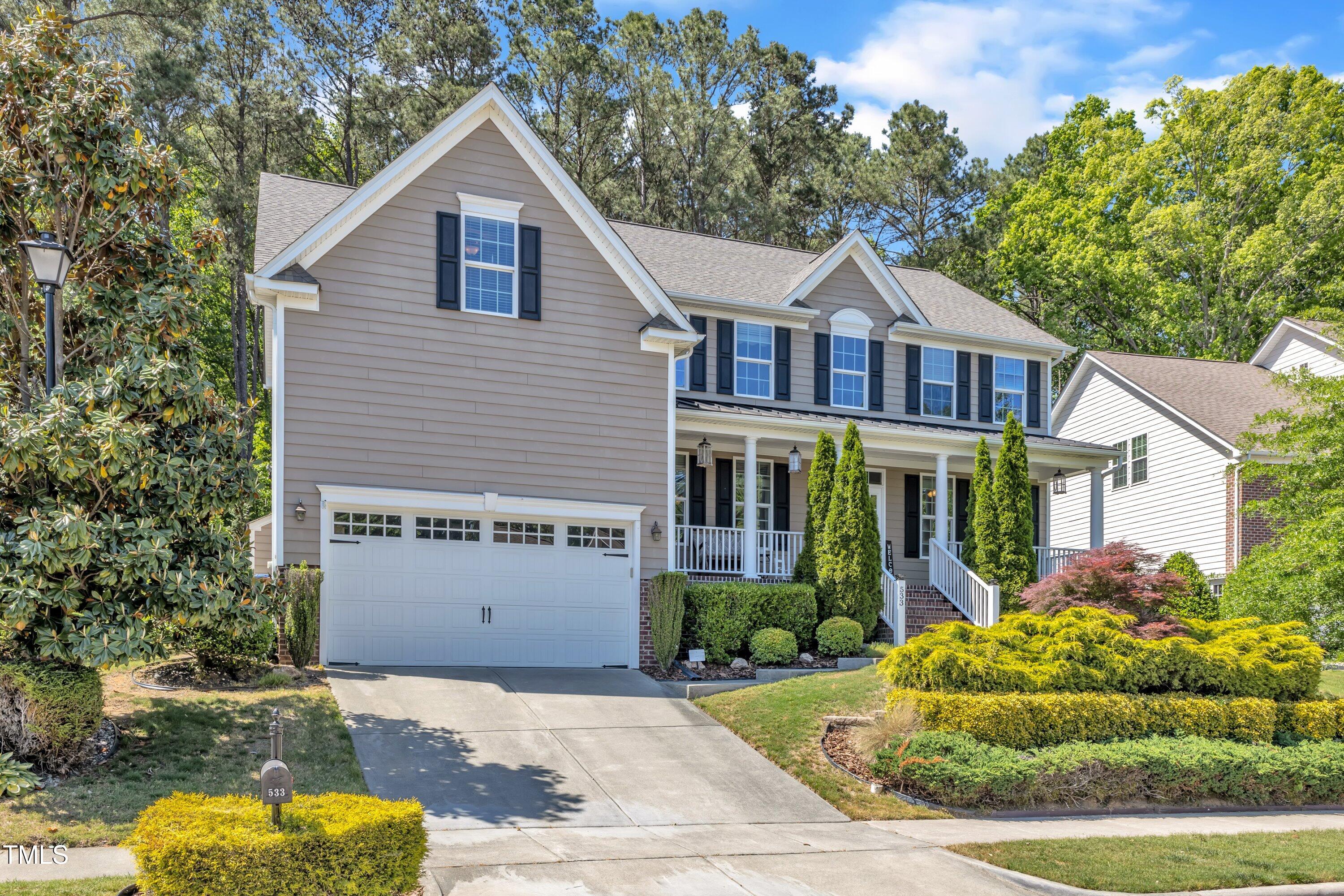 533 Opposition Way Wake Forest, NC 27587 - Photo 2 of 87 a view of a yard in front of house