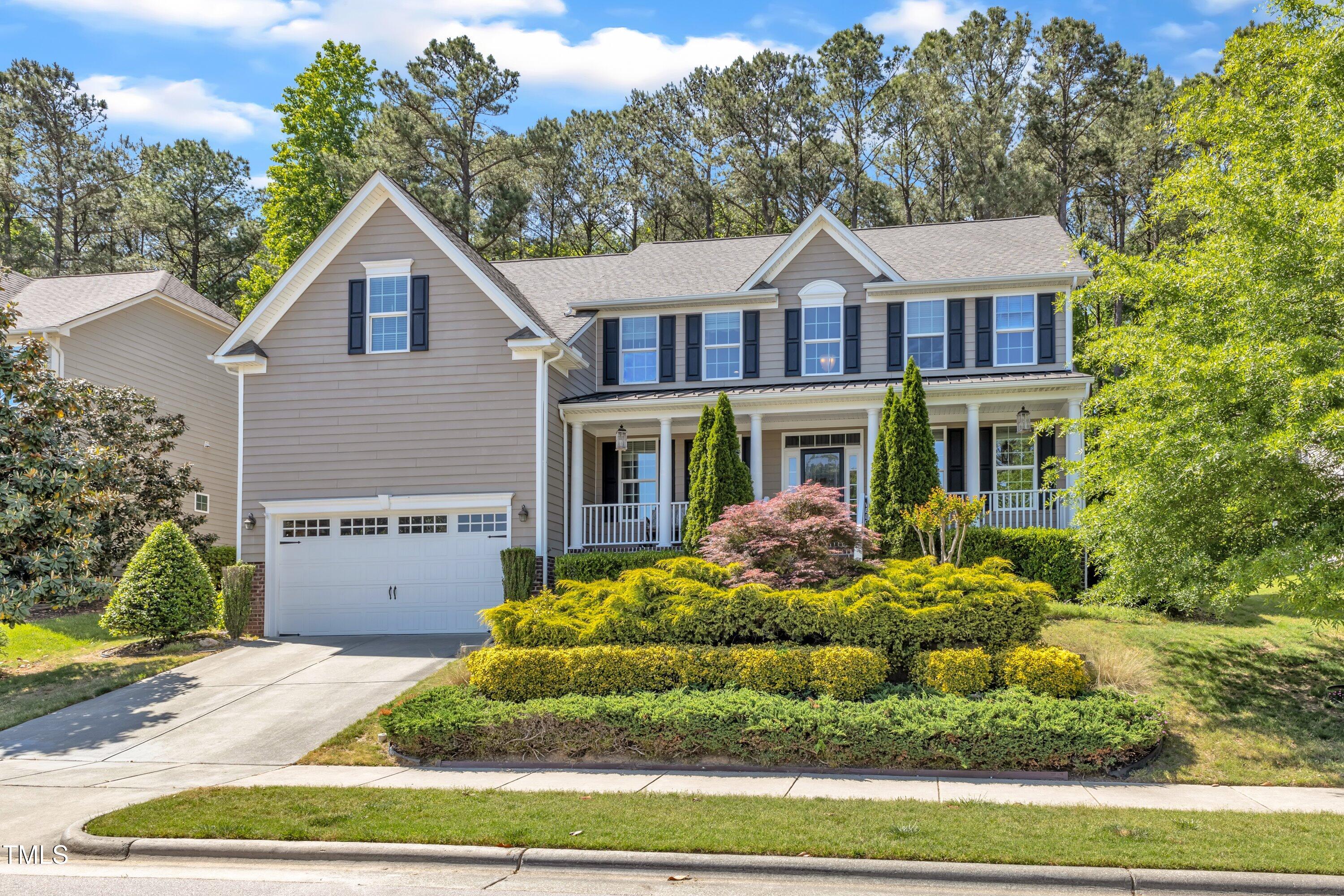 533 Opposition Way Wake Forest, NC 27587 - Photo 3 of 87 a front view of a house with a yard