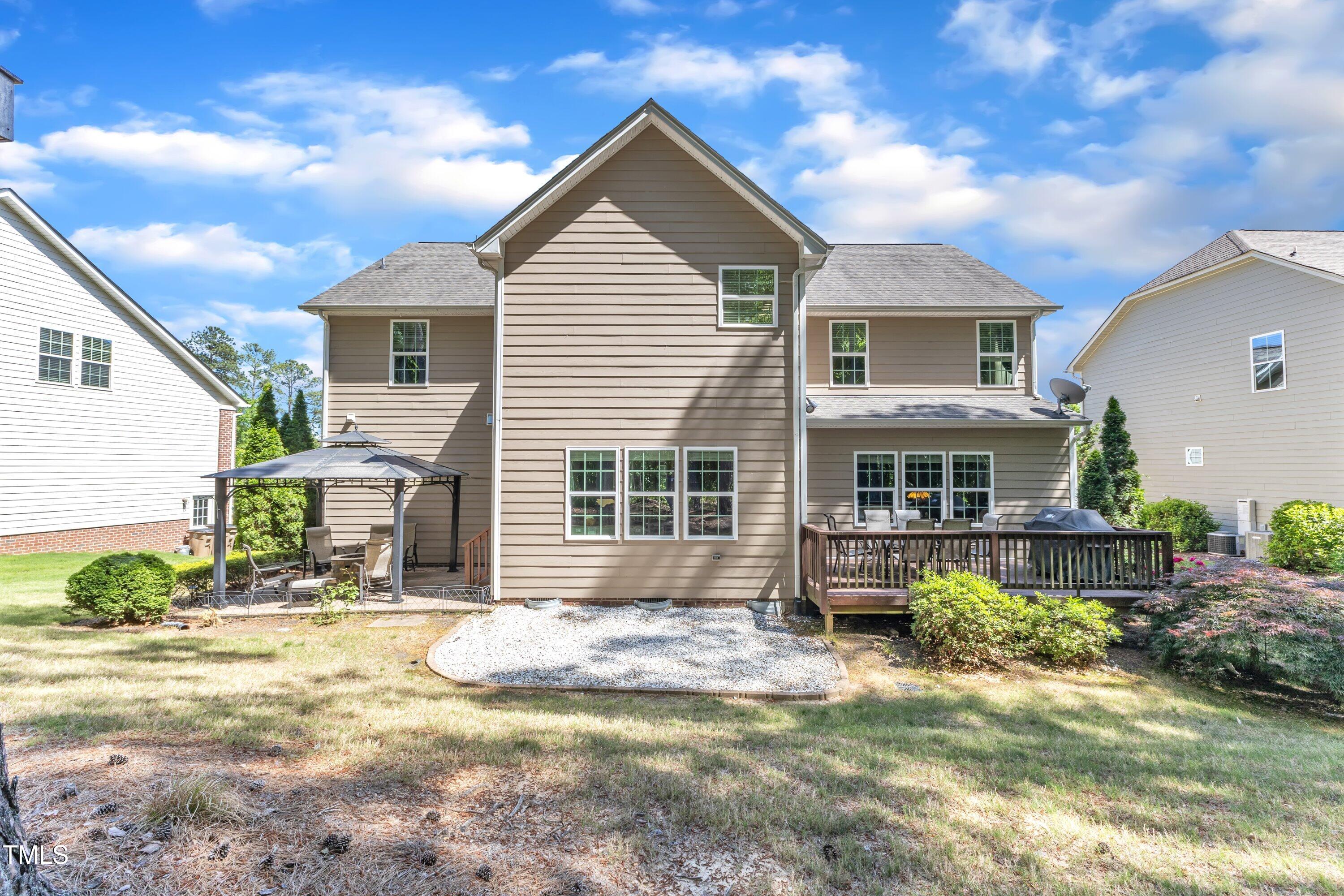 533 Opposition Way Wake Forest, NC 27587 - Photo 69 of 87 a front view of a house with a yard