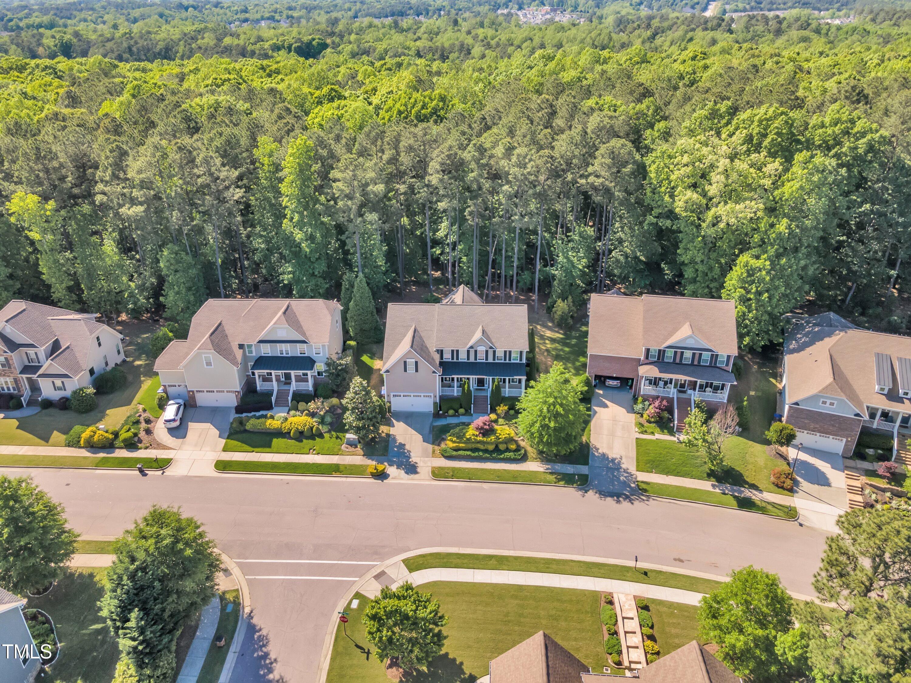 533 Opposition Way Wake Forest, NC 27587 - Photo 77 of 87 an aerial view of residential houses with outdoor space and swimming pool