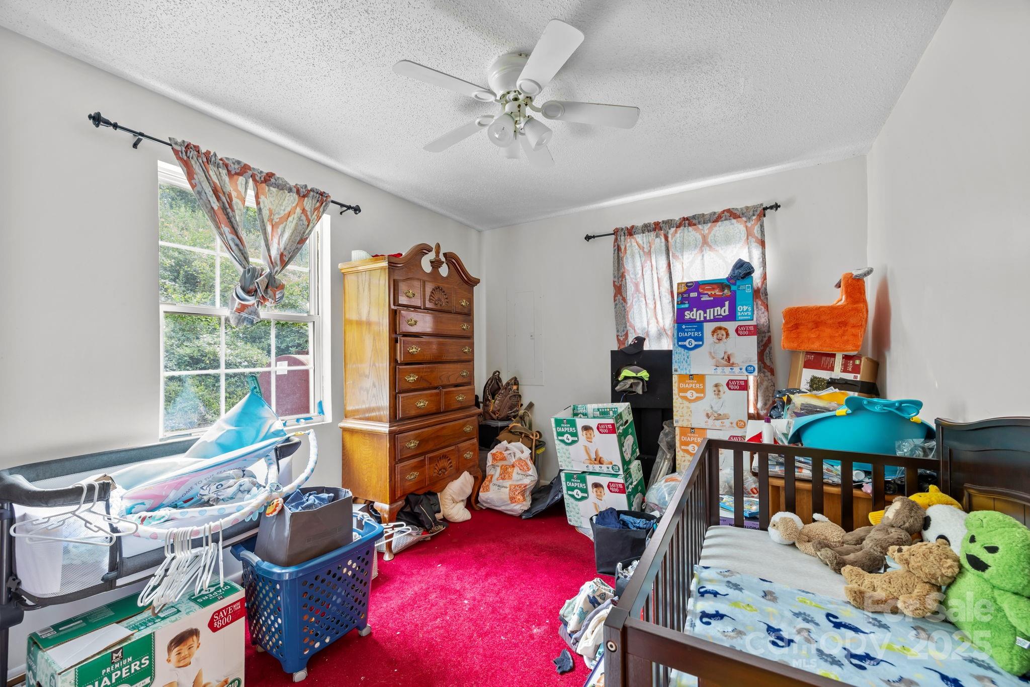 590 Sweet Water Road Marshall, NC 28753 - Photo 13 of 17 a living room filled with furniture
