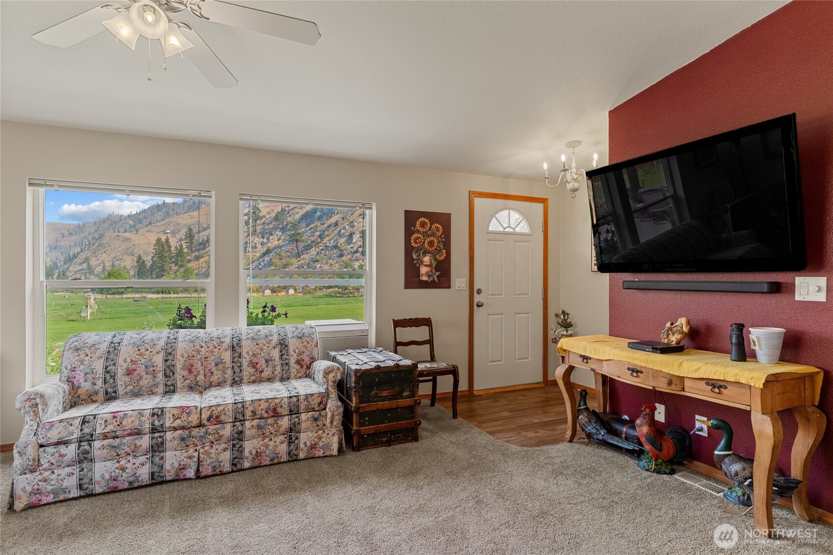 2560 Antoine Creek Road Chelan, WA 98816 - Photo 12 of 38 a living room with furniture and a flat screen tv