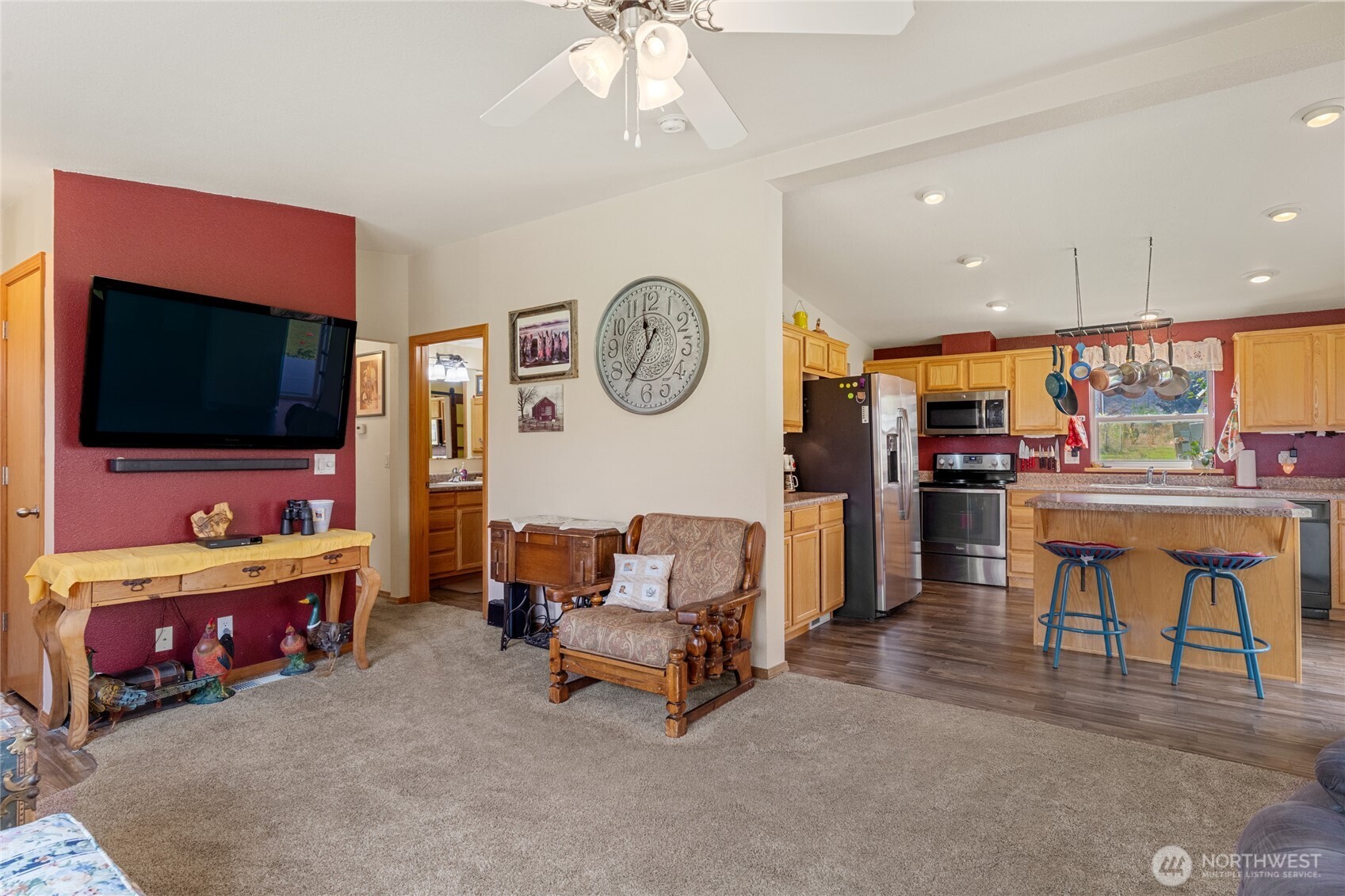 2560 Antoine Creek Road Chelan, WA 98816 - Photo 13 of 38 a living room with furniture and a flat screen tv