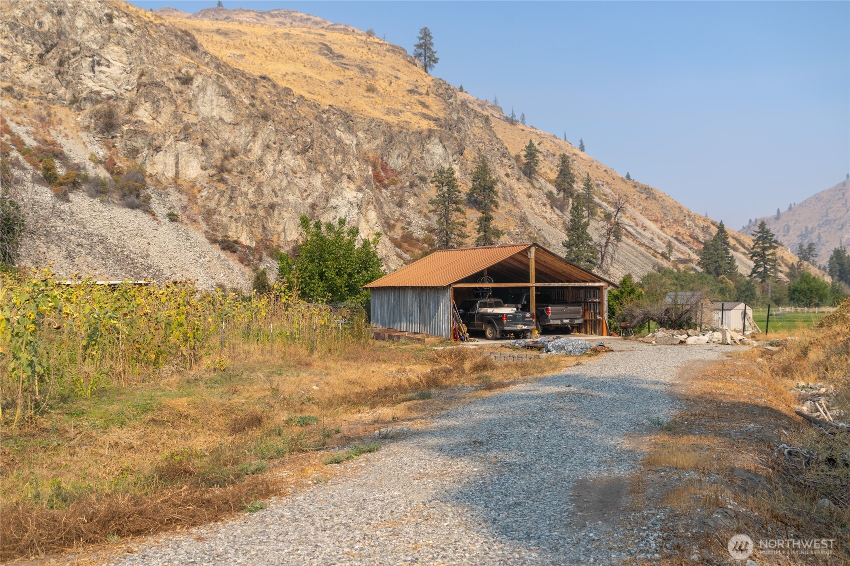 2560 Antoine Creek Road Chelan, WA 98816 - Photo 27 of 38 a front view of a house with a yard