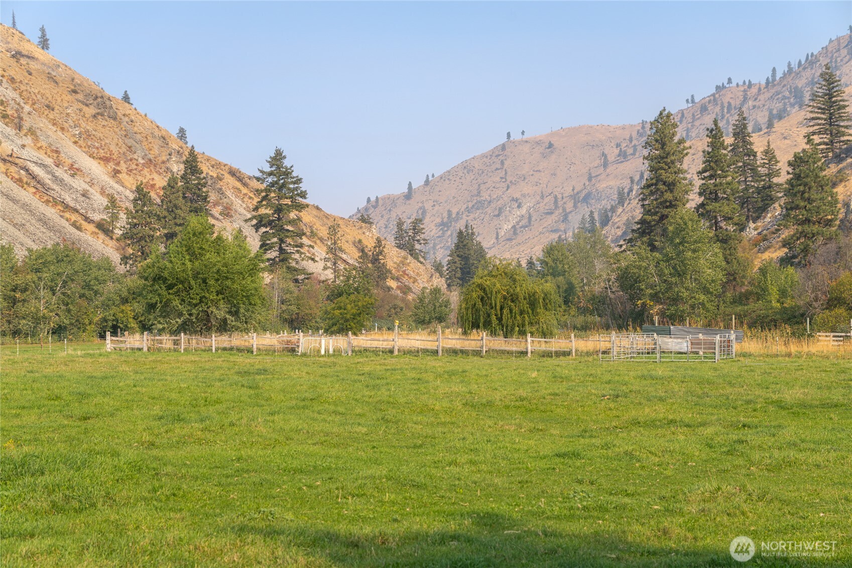 2560 Antoine Creek Road Chelan, WA 98816 - Photo 32 of 38 a view of a water with a building in the background