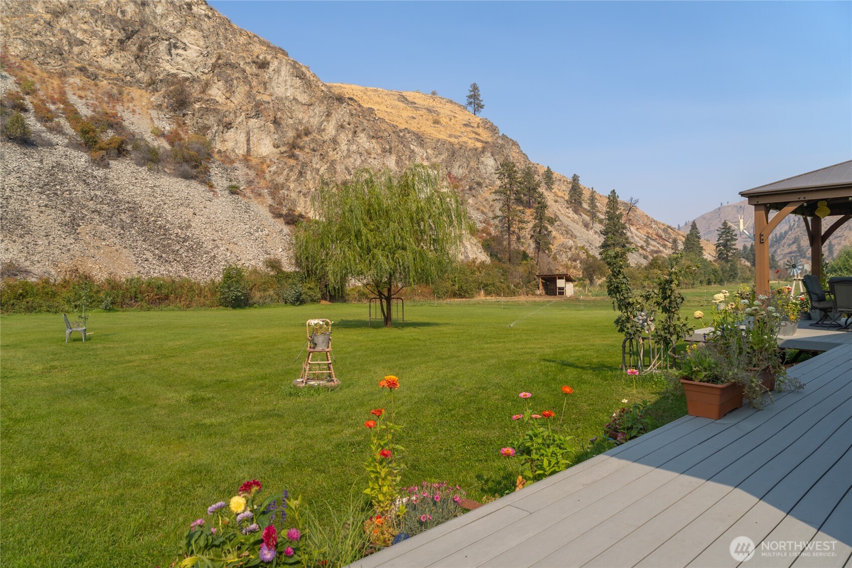 2560 Antoine Creek Road Chelan, WA 98816 - Photo 7 of 38 a view of a garden with an outdoor space