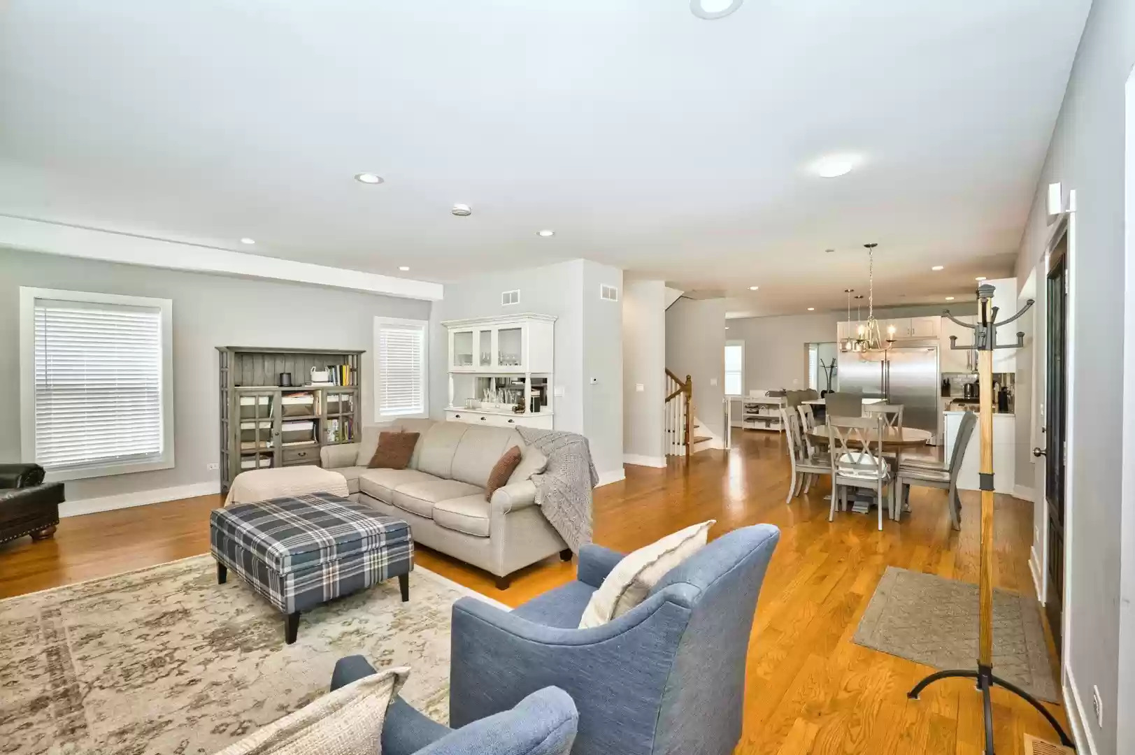 643 Oriole Avenue Park Ridge, IL 60068 - Photo 16 of 31 a living room with furniture wooden floor and a view of kitchen