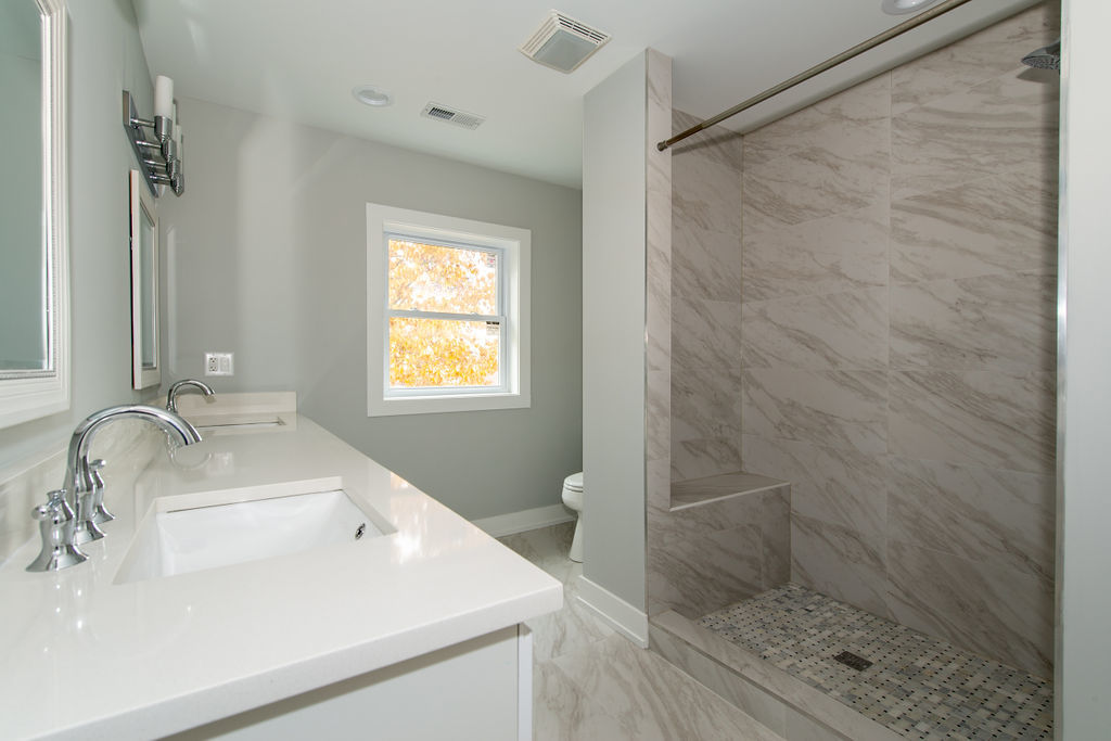 643 Oriole Avenue Park Ridge, IL 60068 - Photo 23 of 31 a bathroom with a sink and a shower