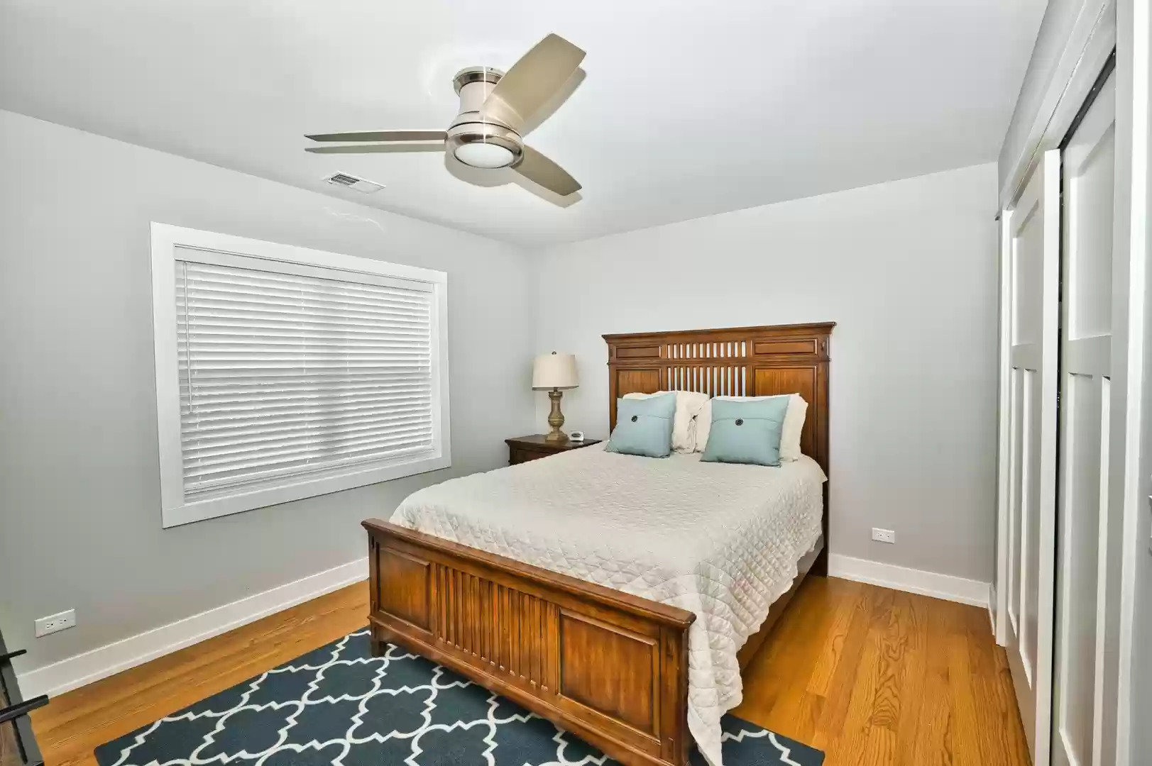 643 Oriole Avenue Park Ridge, IL 60068 - Photo 27 of 31 a bedroom with a bed and a window