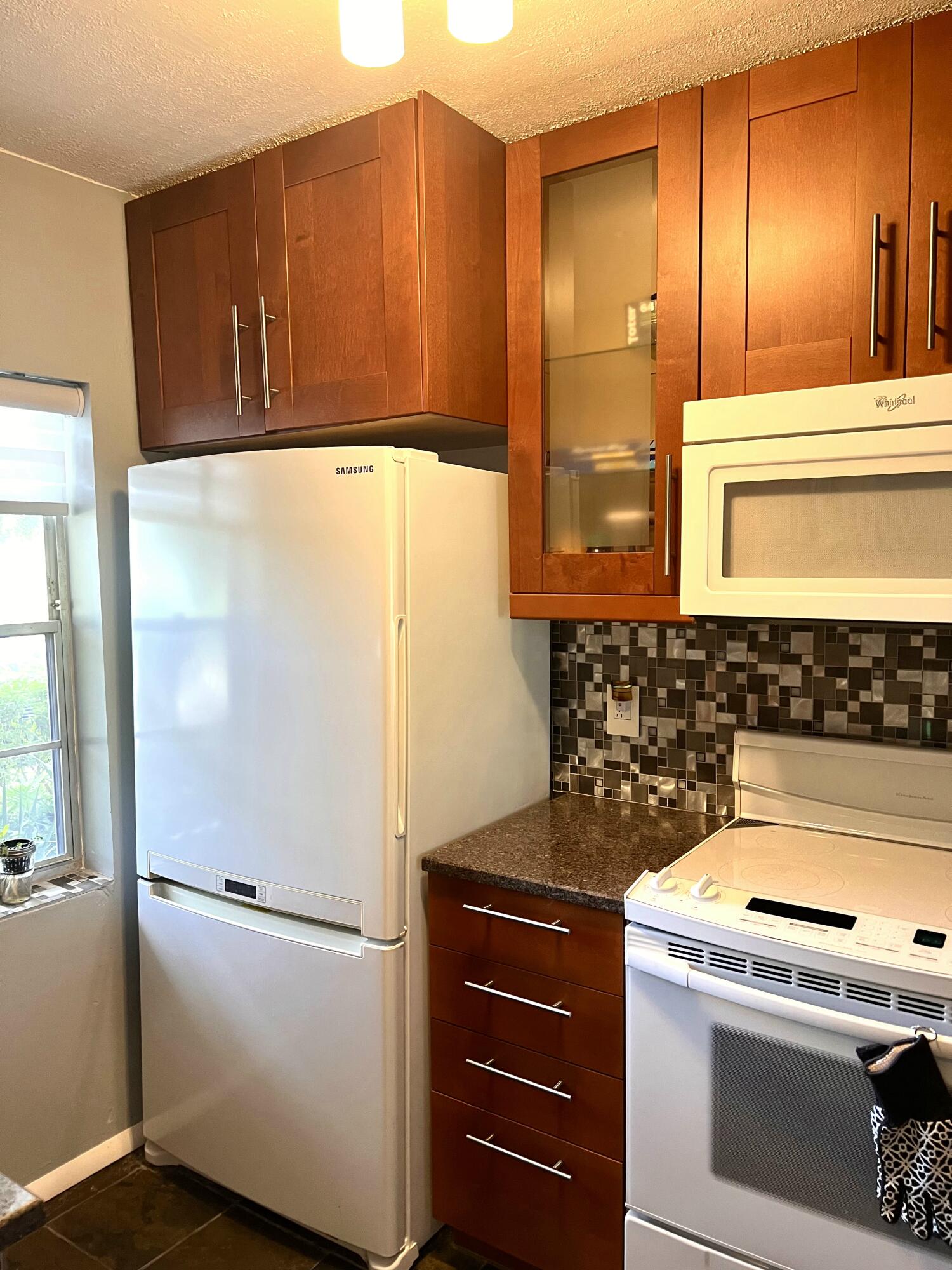 9905 Three Lakes Circle, Unit 12D Boca Raton, FL 33428 - Photo 4 of 12 BA15B2C3-159A-429B-BC04-D8FA32524C6C_1_2