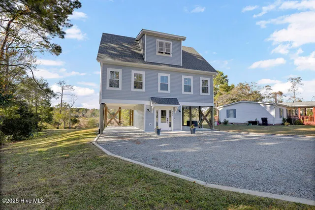 $715,000 | 504 Creek Drive, Hampstead, NC 28443