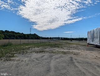 720 Pinehurst Road New Egypt, NJ 08533 - Photo 2 of 7 Vast open land under a blue sky.