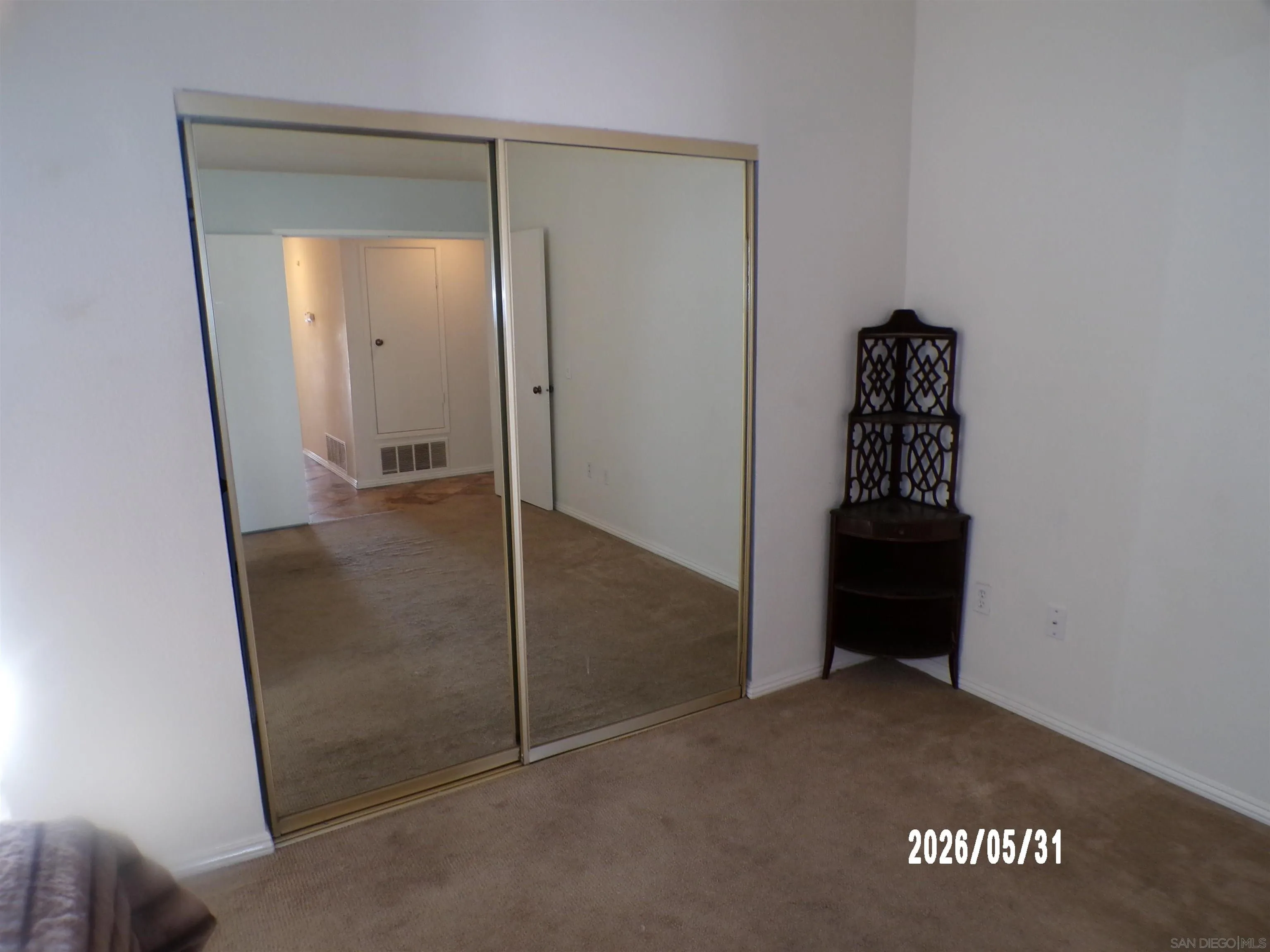 13592 Ridley Road San Diego, CA 92129 - Photo 17 of 25 an empty room with mirror