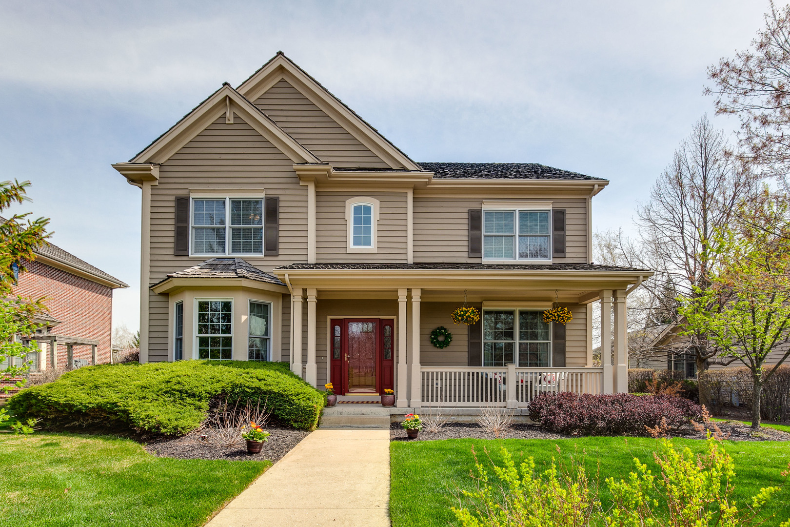 front view of a house with a yard