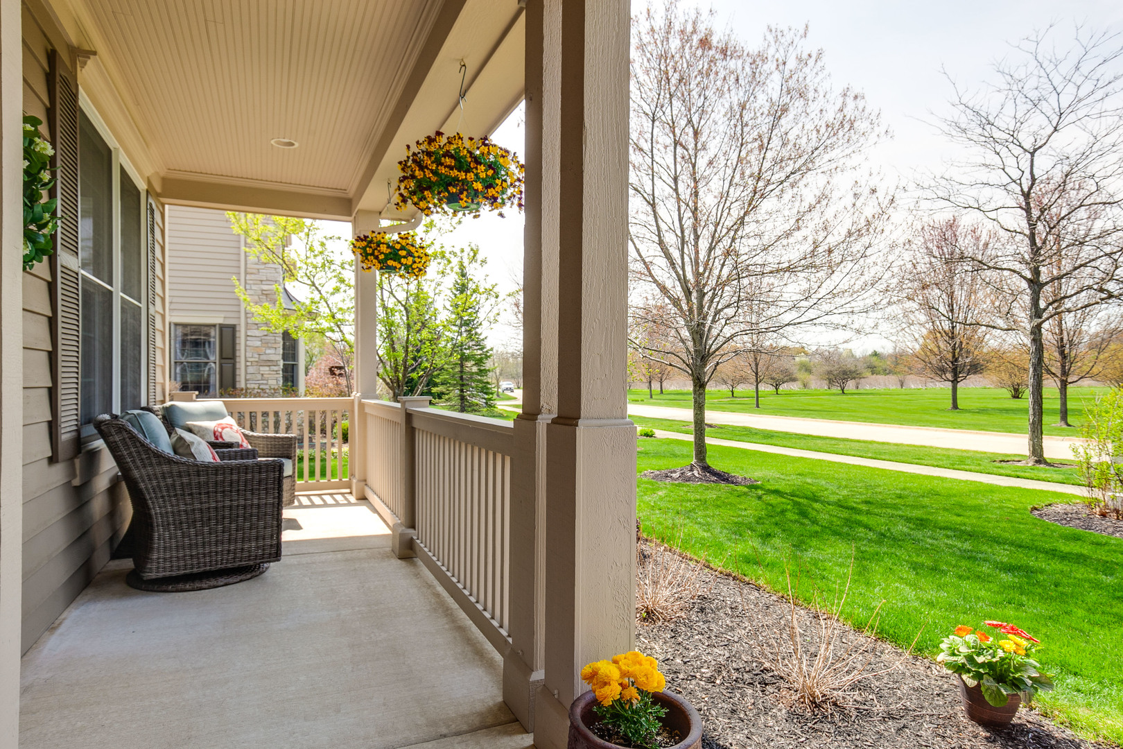 920 Symphony Drive Lake Forest, IL 60045 - Photo 2 of 28 a view of a porch with furniture and garden
