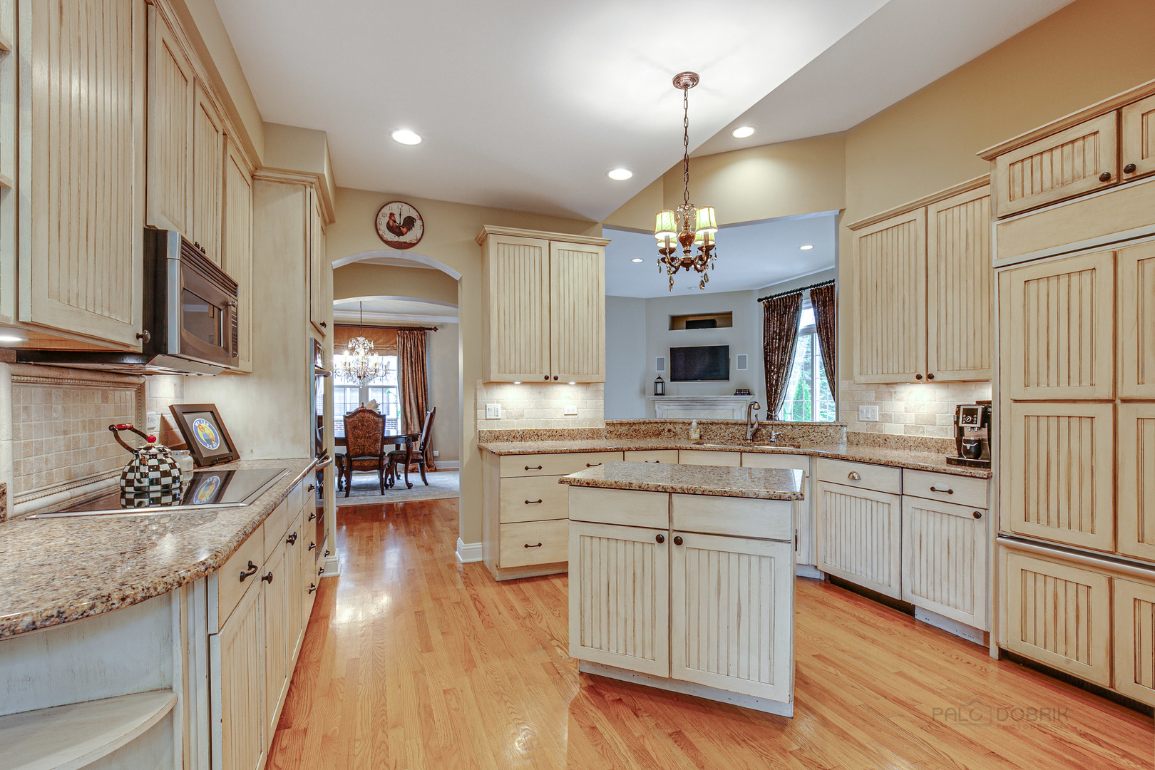920 Symphony Drive Lake Forest, IL 60045 - Photo 11 of 28 a kitchen with stainless steel appliances granite countertop a sink stove and refrigerator