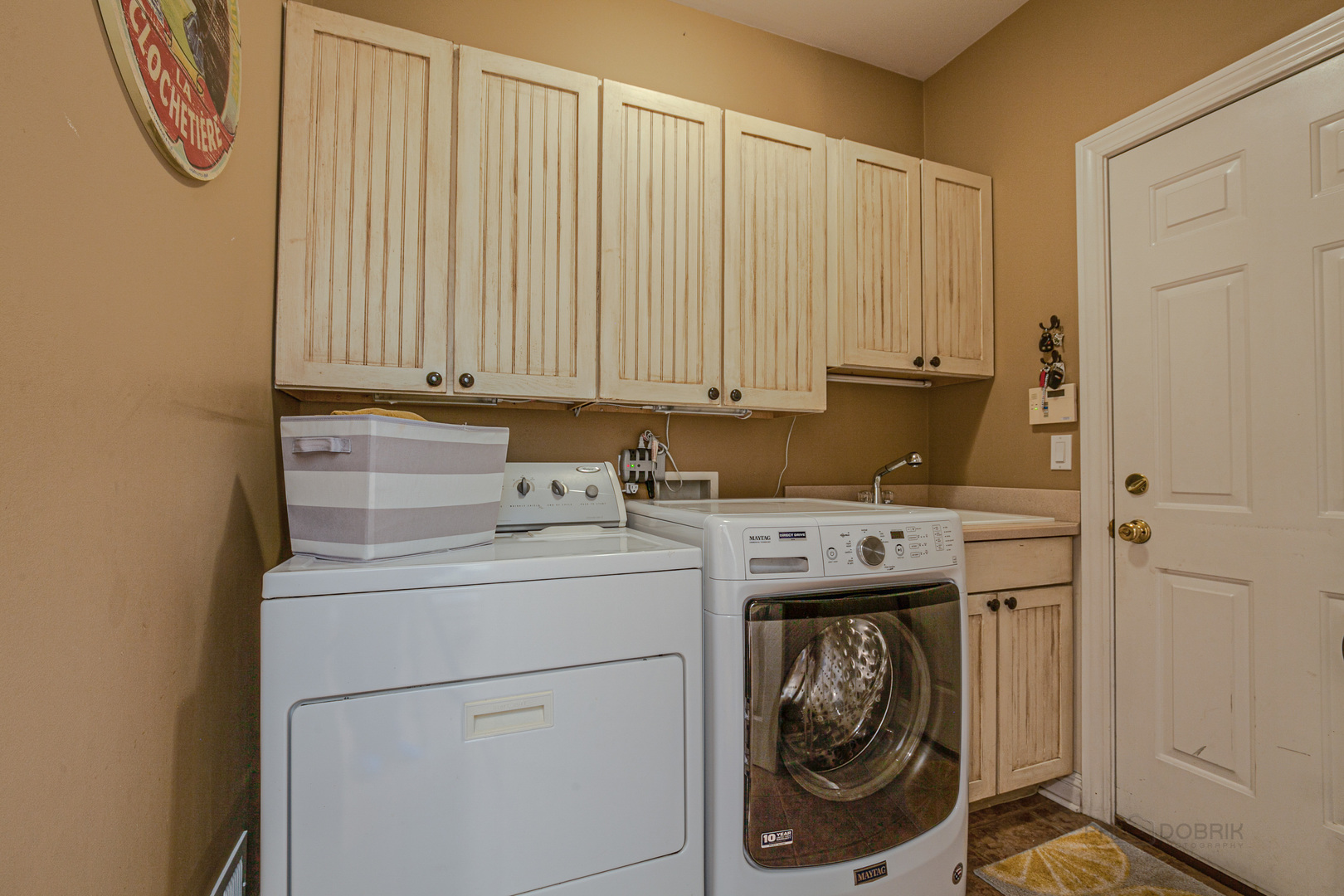 920 Symphony Drive Lake Forest, IL 60045 - Photo 15 of 28 a utility room with dryer and washer