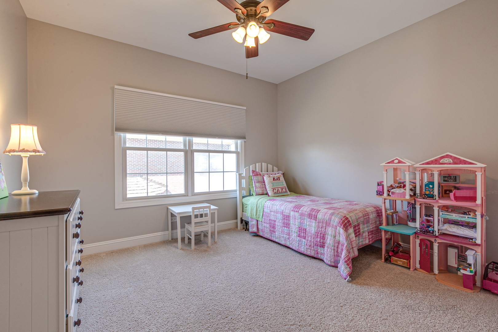 920 Symphony Drive Lake Forest, IL 60045 - Photo 22 of 28 a bedroom with a bed and a chandelier