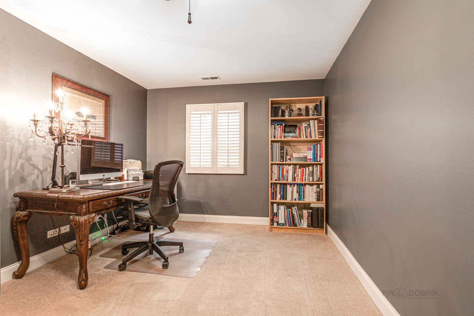 920 Symphony Drive Lake Forest, IL 60045 - Photo 25 of 28 a view of a workspace with furniture and a window