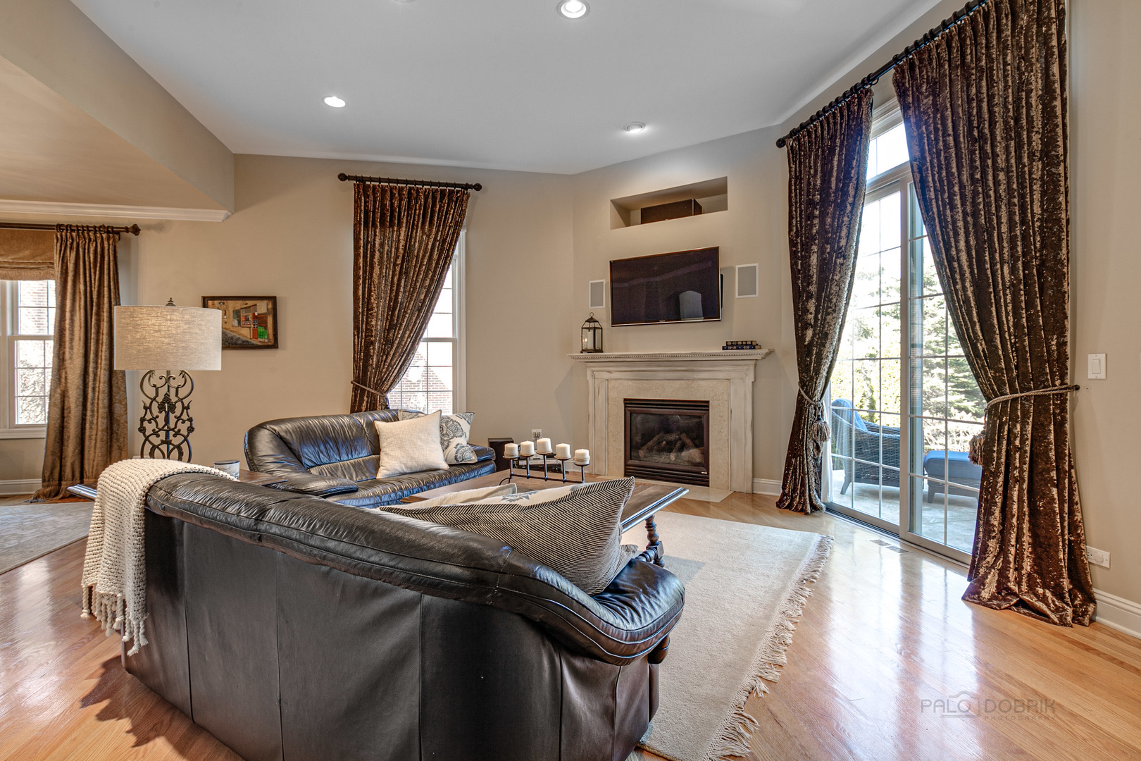 920 Symphony Drive Lake Forest, IL 60045 - Photo 8 of 28 a living room with furniture fireplace and flat screen tv