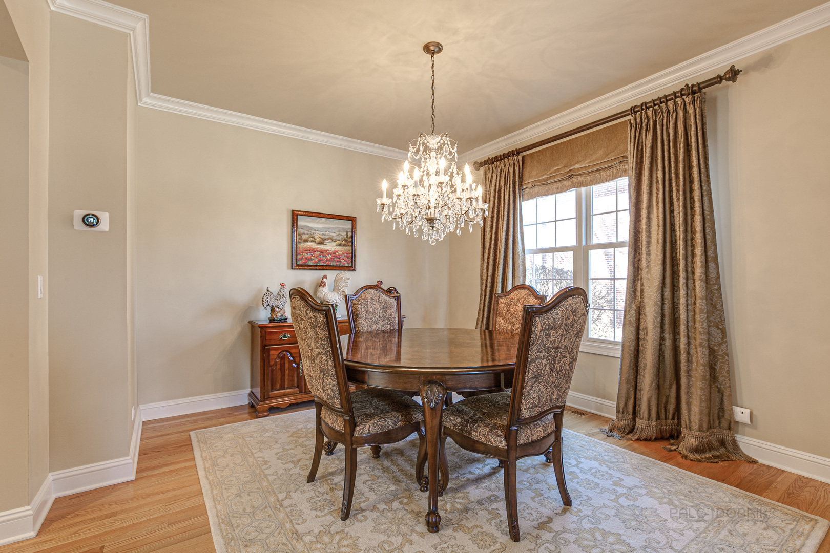 920 Symphony Drive Lake Forest, IL 60045 - Photo 10 of 28 a view of a dining room with furniture and window