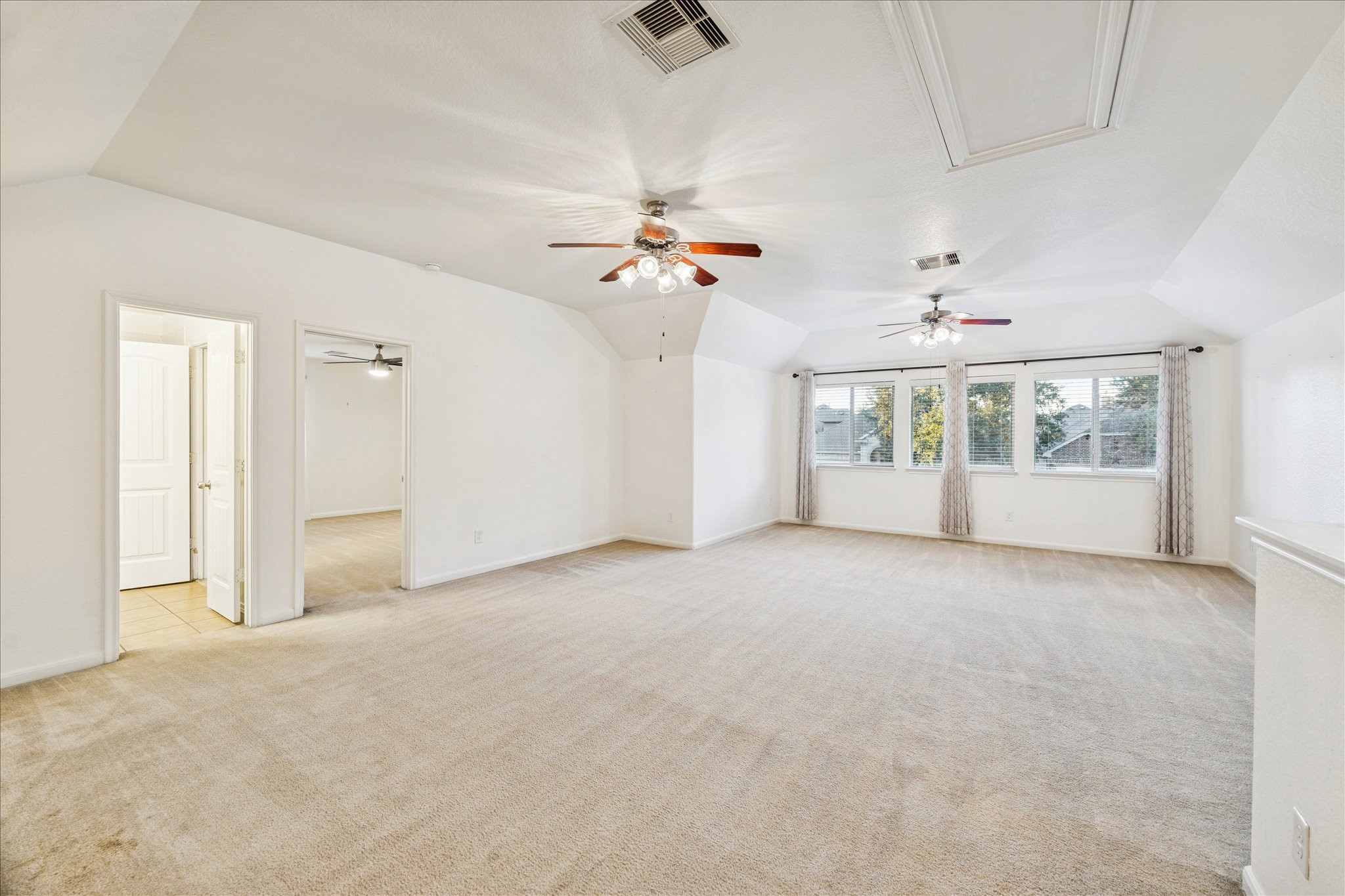 191 Maple Grove Drive Conroe, TX 77384 - Photo 25 of 31 a view of an empty room with a window
