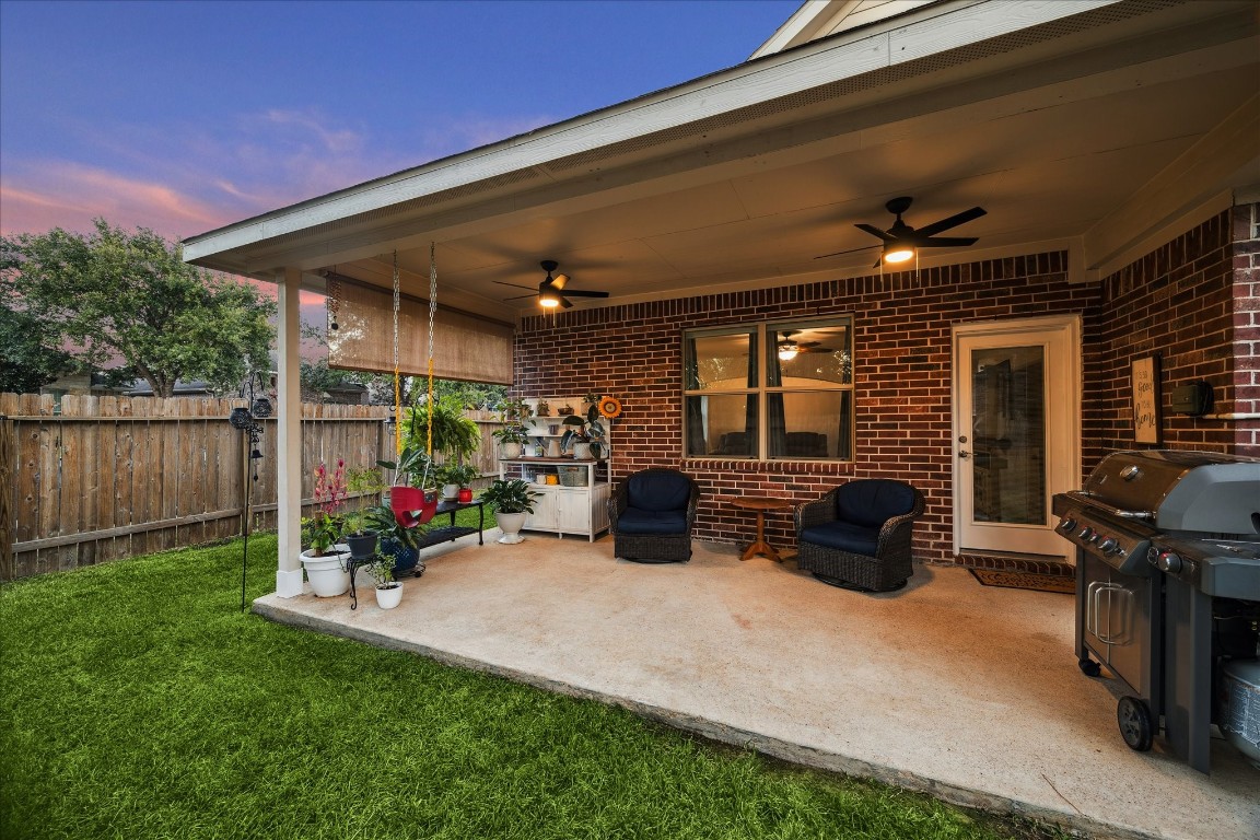 191 Maple Grove Drive Conroe, TX 77384 - Photo 29 of 31 a view of a chairs and tables in the patio