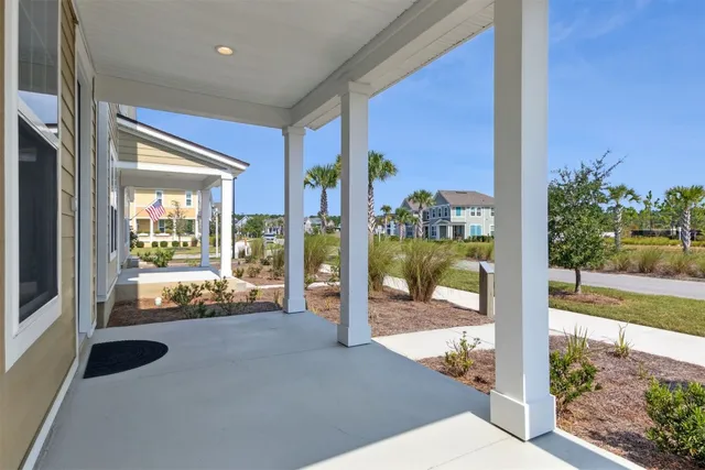 a view of a porch with seating area