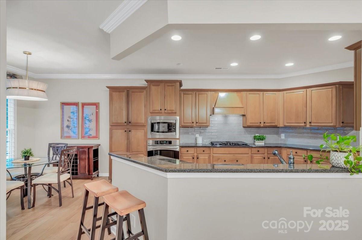 51225 Daffodil Court Fort Mill, SC 29707 - Photo 19 of 45 a large kitchen with kitchen island a large window