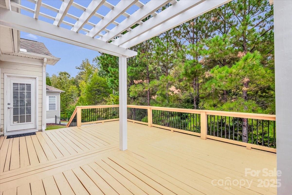 51225 Daffodil Court Fort Mill, SC 29707 - Photo 36 of 45 a view of balcony with floor to ceiling window and wooden floor