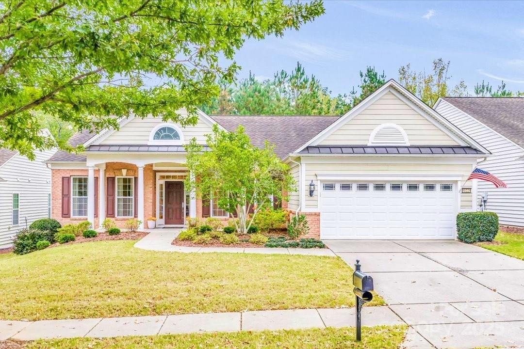 51225 Daffodil Court Fort Mill, SC 29707 - Photo 45 of 45 a front view of a house with garden
