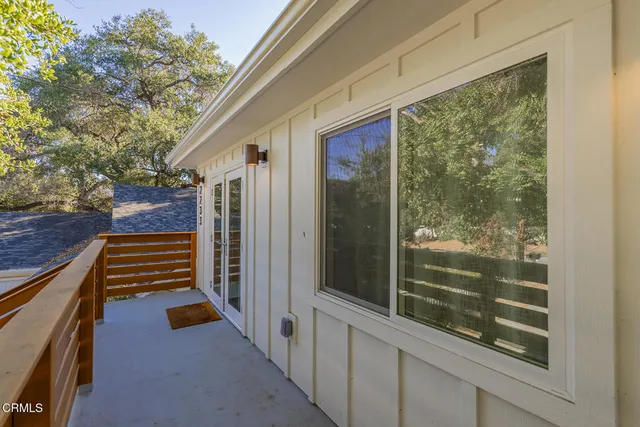 a view of a house with lounge chair