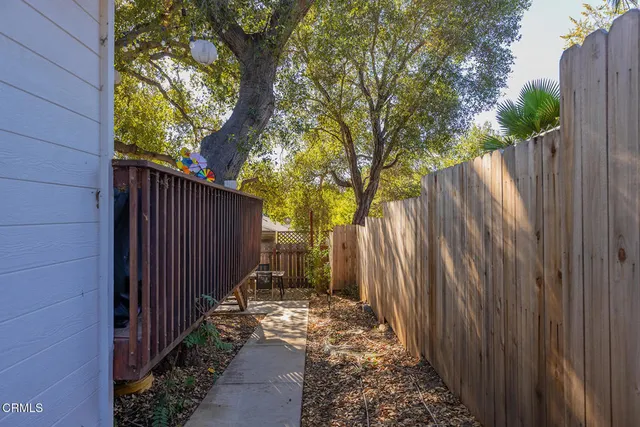 a outdoor living space with furniture and potted plants