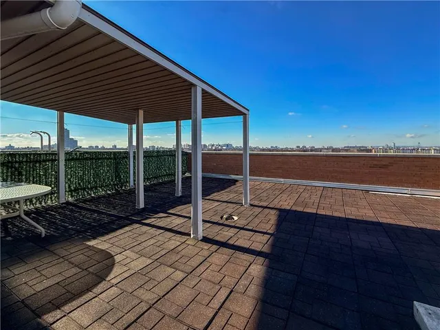 a view of a chairs and tables in the patio