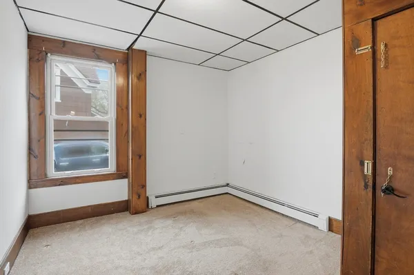 a view of a room that has a window in it