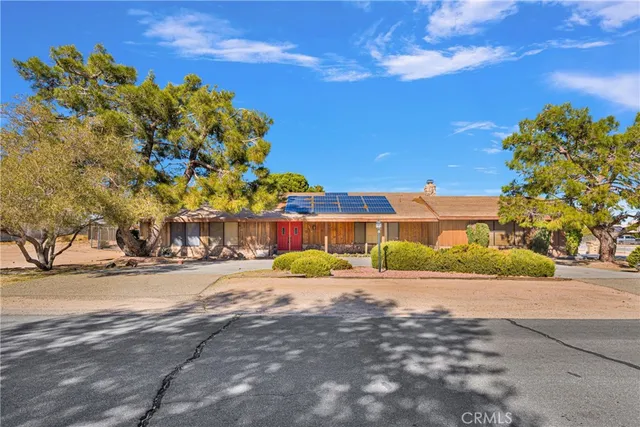 a view of a street with a building in the background