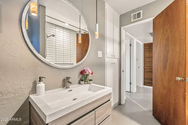 a view of a backyard with sitting area