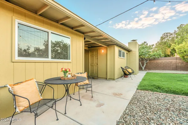 a view of a yard with an outdoor space