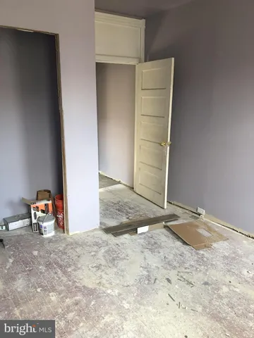 an empty room with closet