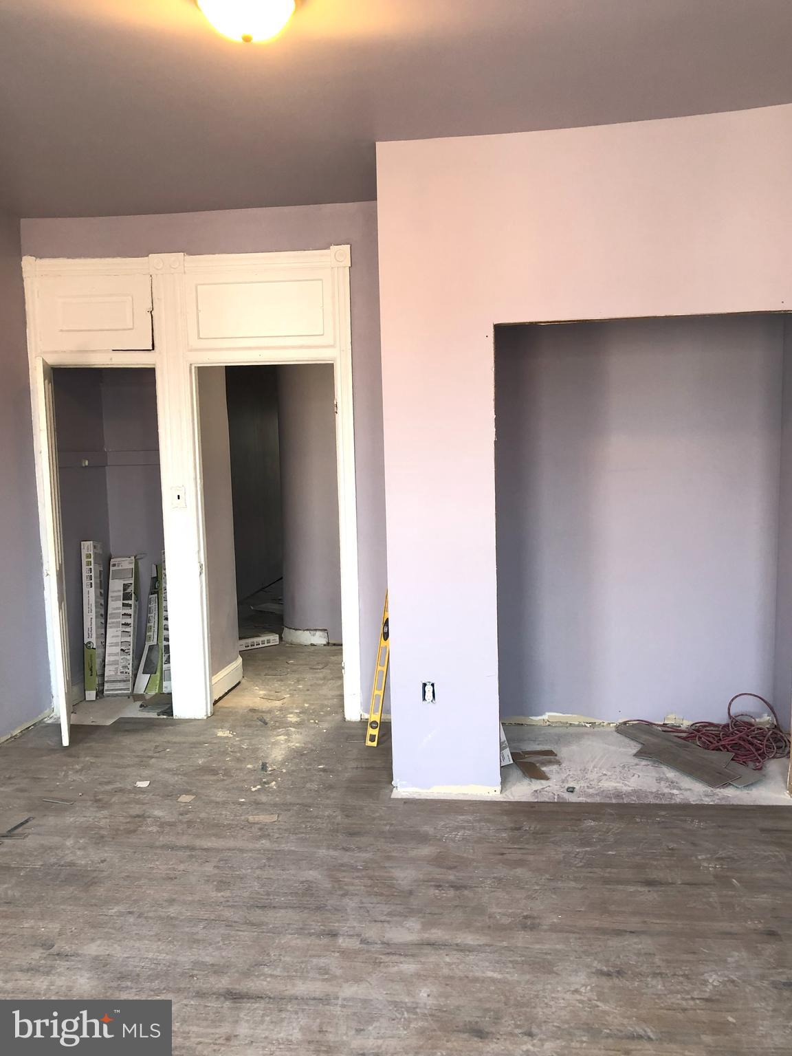2323 McCulloh Street Baltimore, MD 21217 - Photo 9 of 20 a view of a room with wooden floor