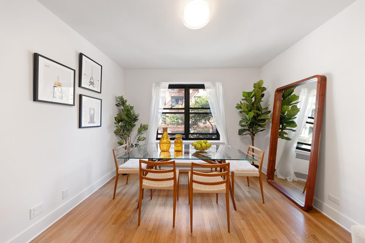 425 Central Park West, Unit 3J Manhattan, NY 10025 - Photo 2 of 9 a dining room with furniture and window