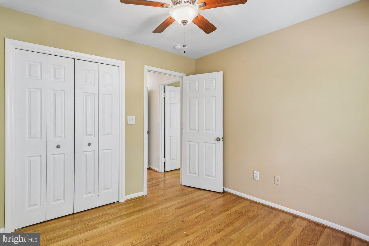76 Timber Rock Road Gaithersburg, MD 20878 - Photo 31 of 51 wooden floor in an empty room with a window