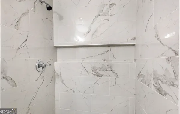 a bathroom with a bathtub