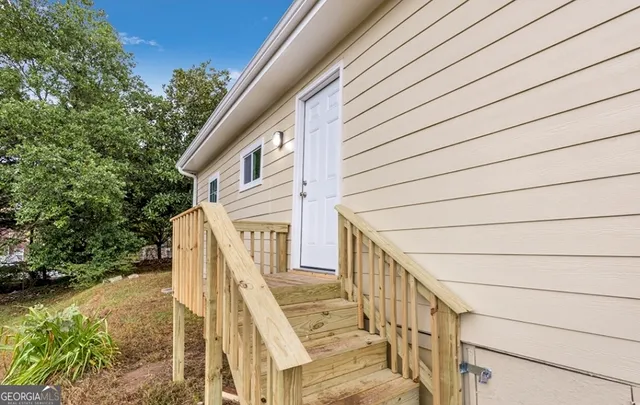a view of deck with mountain view and wooden floor