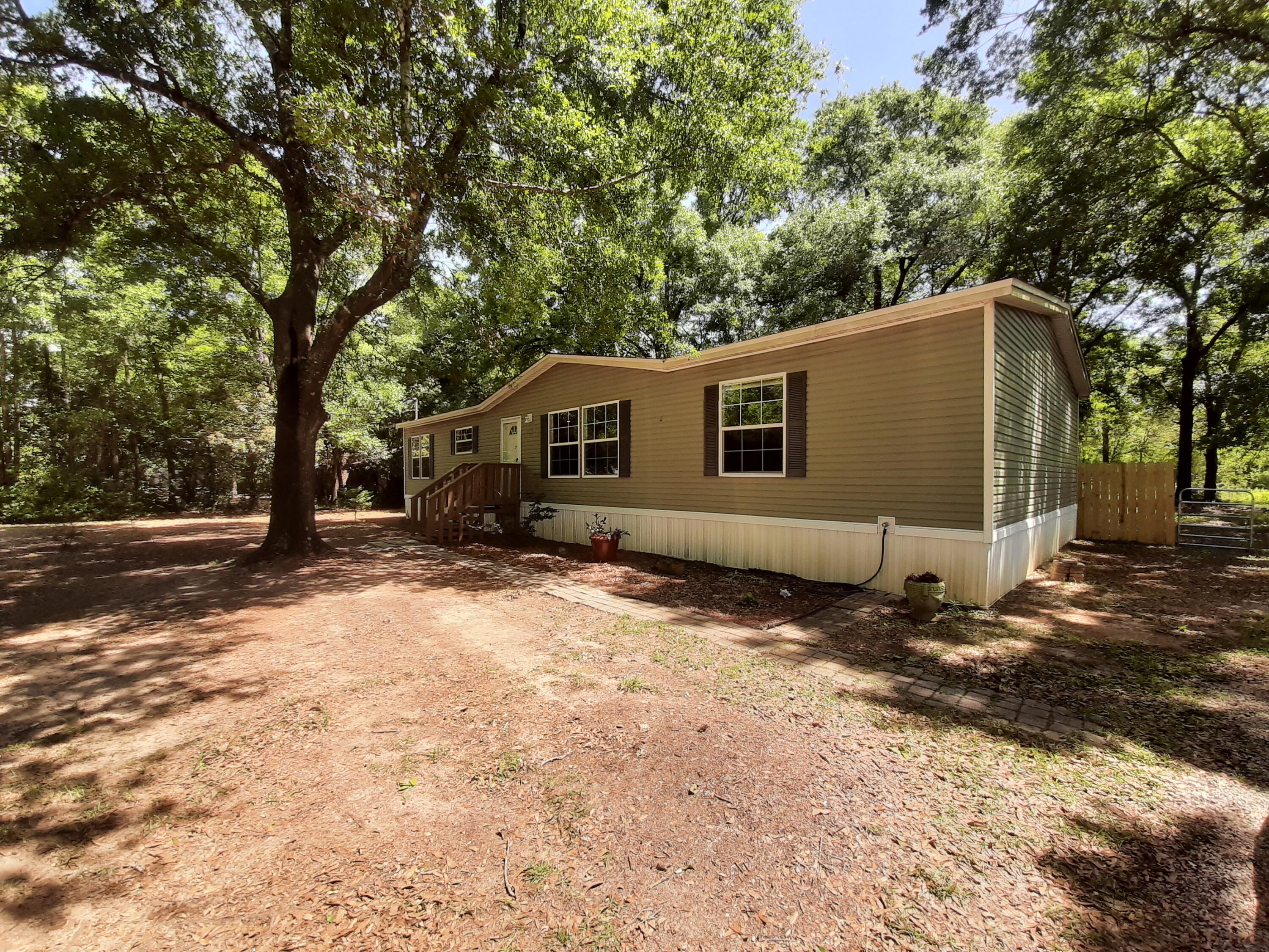 4030 Huckleberry Finn Road Milton, FL 32583 - Photo 2 of 31 h front 4