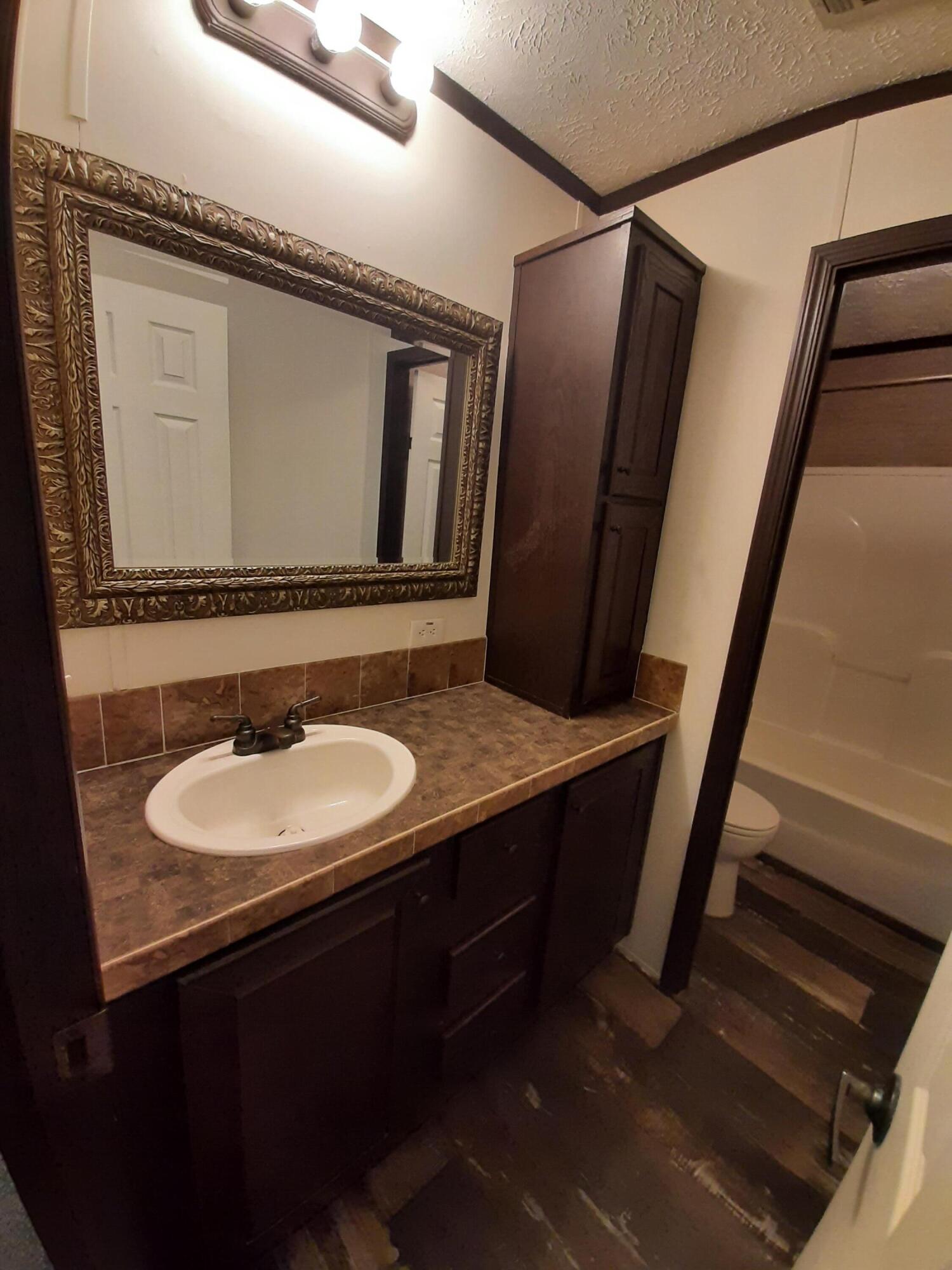 4030 Huckleberry Finn Road Milton, FL 32583 - Photo 29 of 31 h guest bath 1