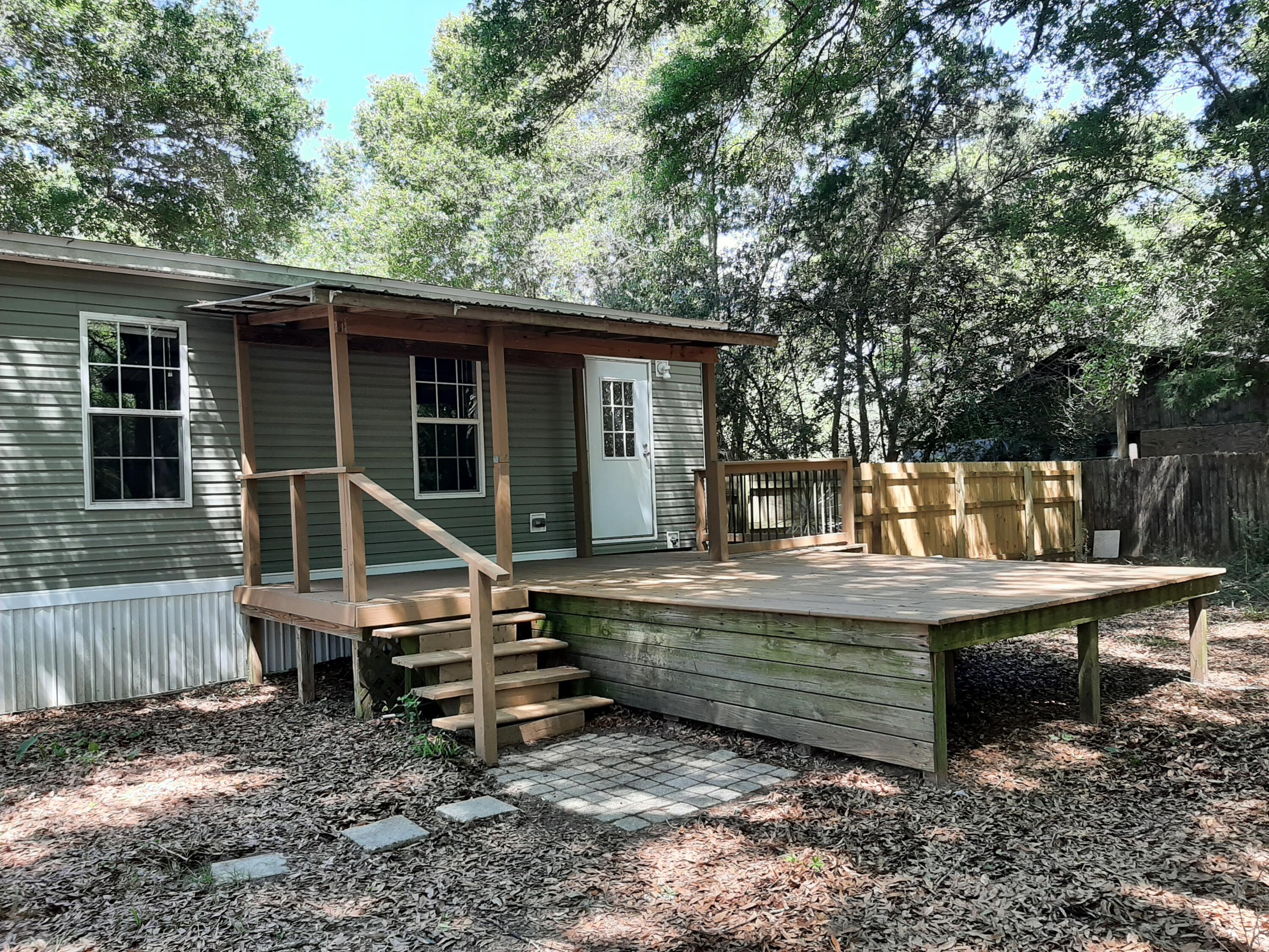 4030 Huckleberry Finn Road Milton, FL 32583 - Photo 9 of 31 h back porch