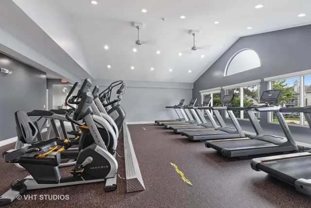 a view of a backyard with sitting area