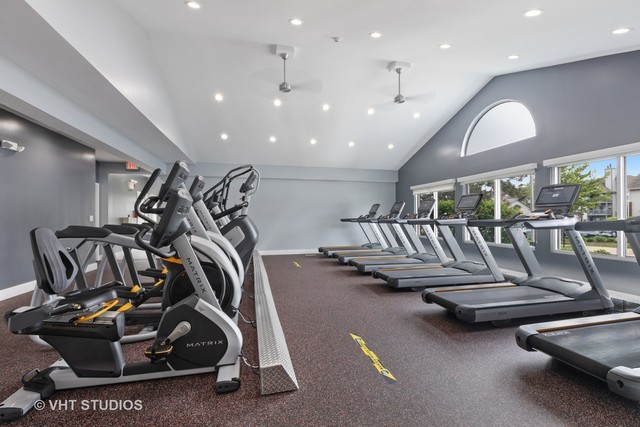 53 Kensington Circle, Unit 106 Wheaton, IL 60189 - Photo 29 of 36 a view of a room with gym equipment